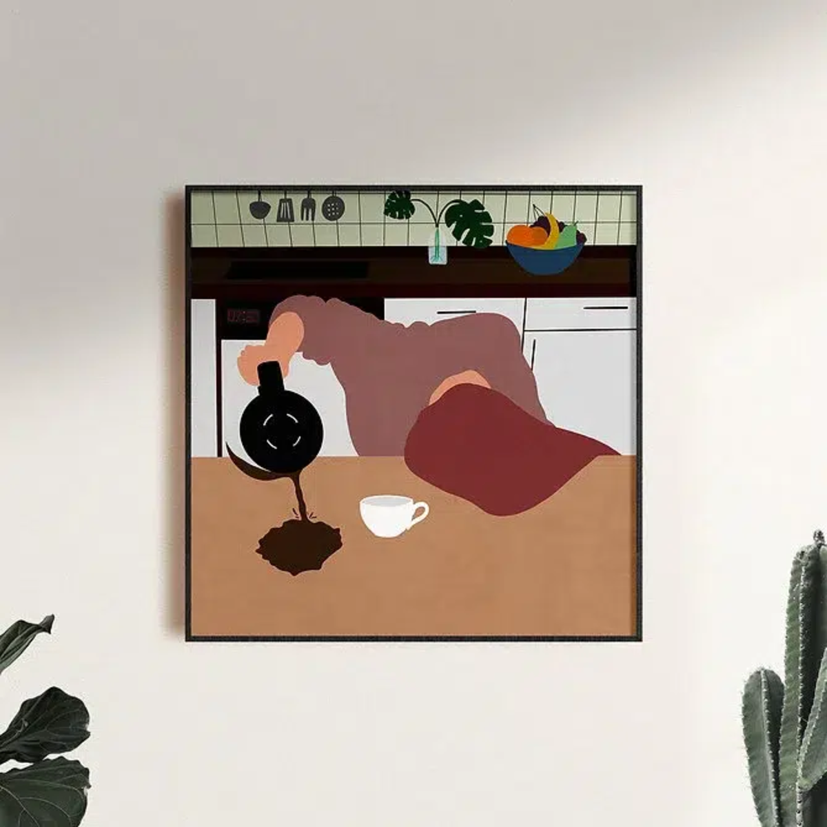 Photo d'une création de Pennika, accrochée au mur. C'est une femme dont la tête est posée sur la table et qui se verse du café qui coule à côté de la tasse